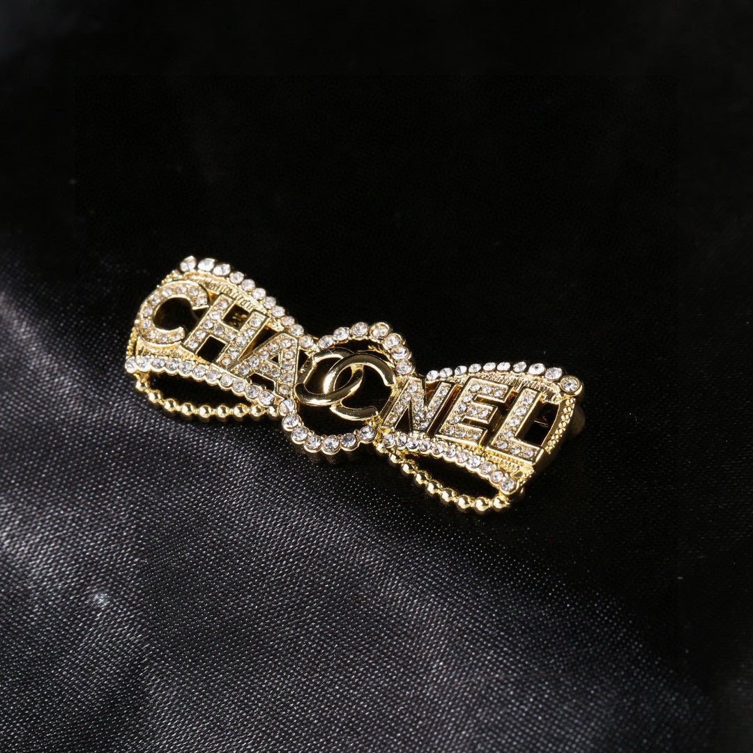 Double-C Emblem Brooch in Polished Metal-Tone – Design 019 styled product view