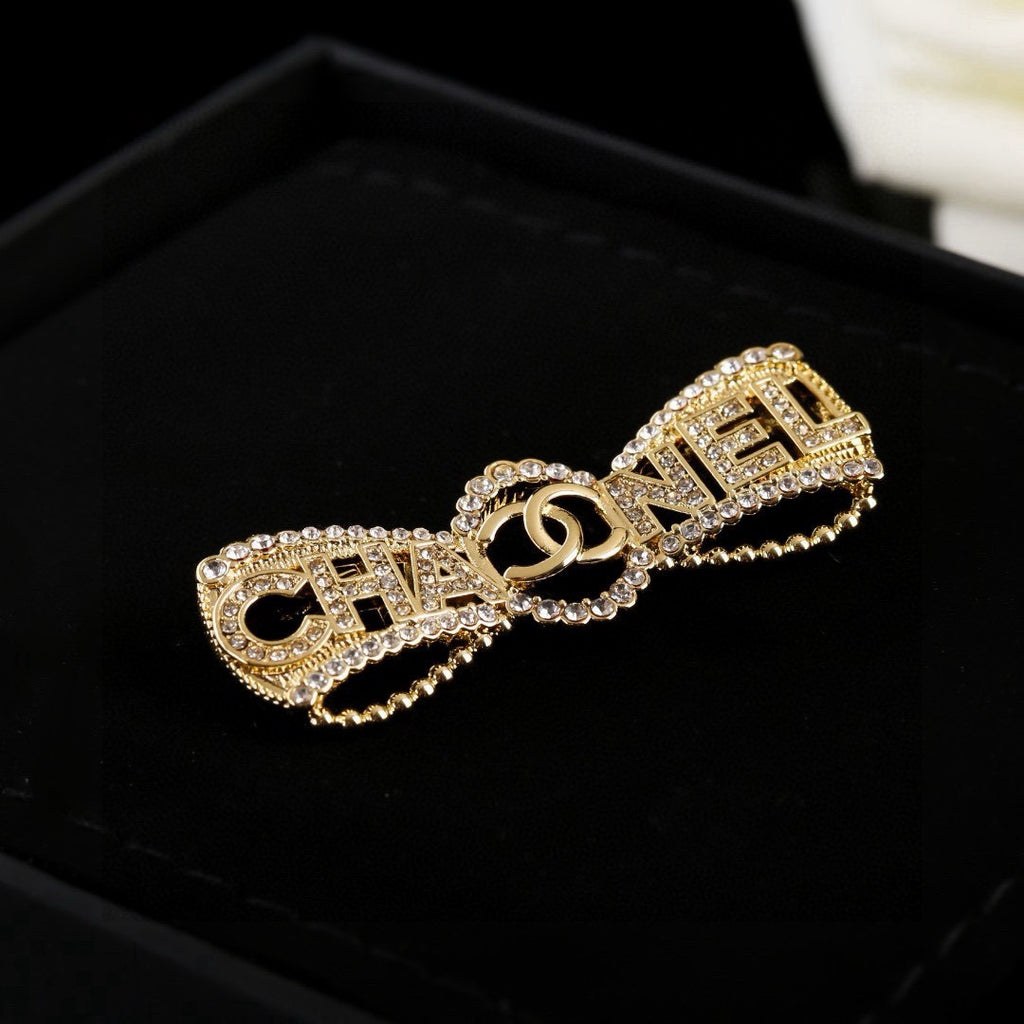 Double-C Emblem Brooch in Polished Metal-Tone – Design 019 detail view