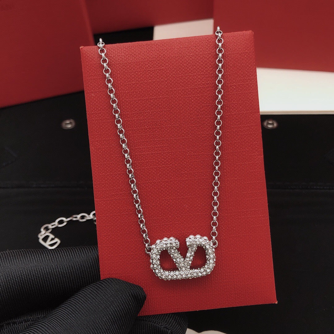Signature Emblem Pendant Necklace in Gold-Tone – Design 06 styled detail