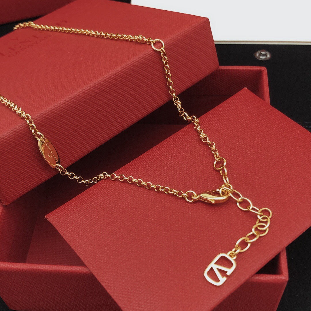 Signature Emblem Pendant Necklace in Gold-Tone – Design 12 front view