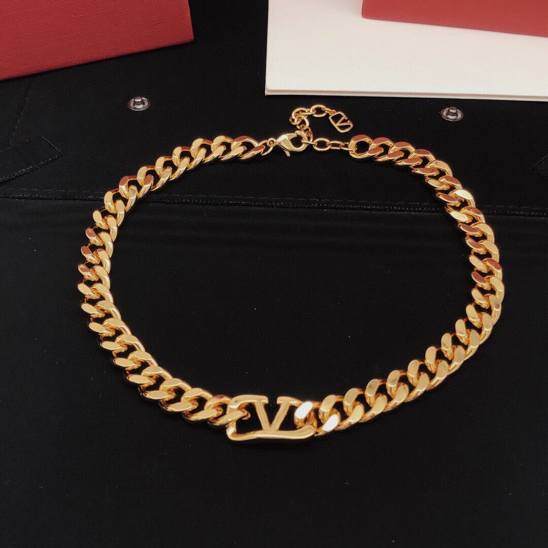 Signature Emblem Pendant Necklace in Gold-Tone – Design 03 close-up view