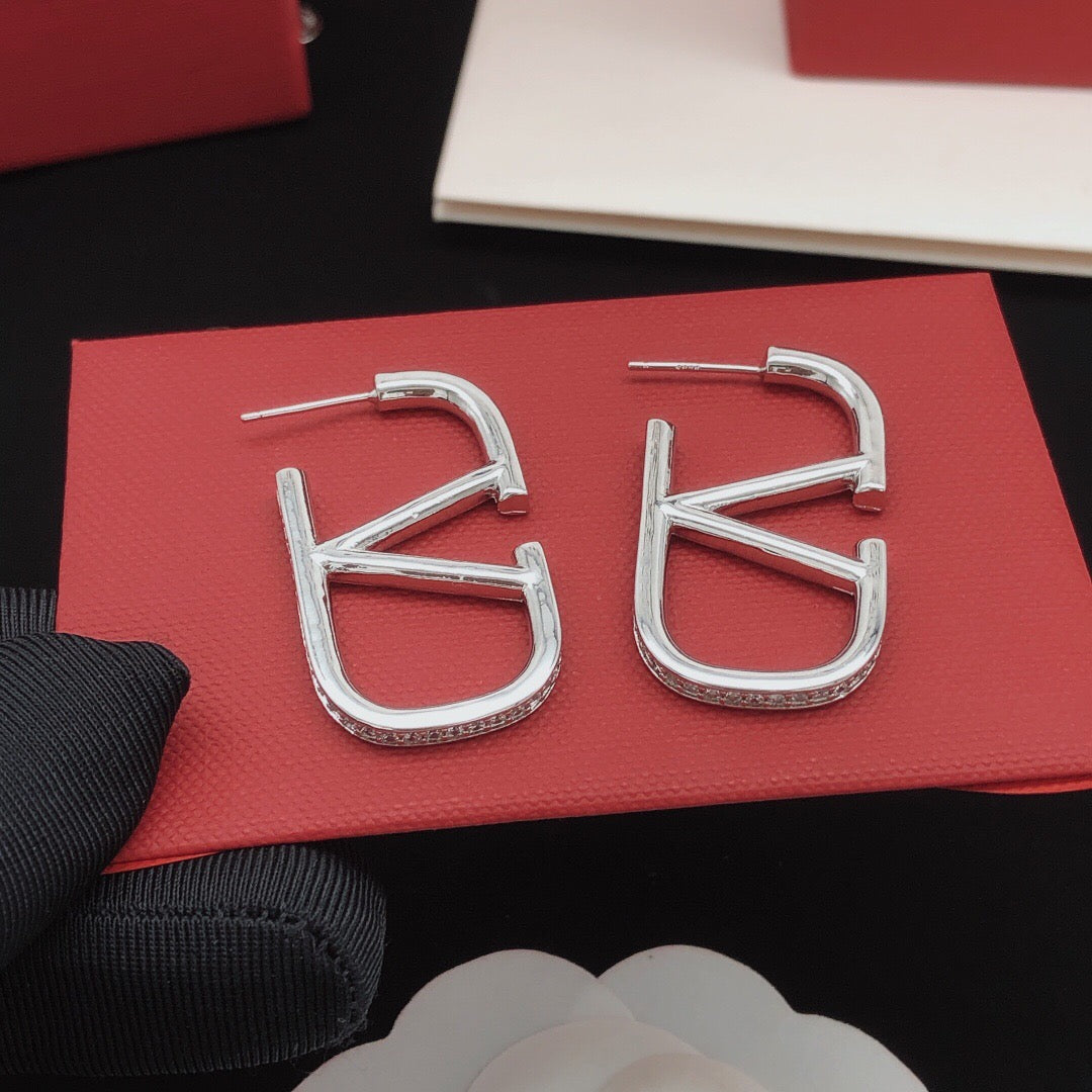 V Emblem Crystal-Accent Stud Earrings – Purple – Design 04 styled detail