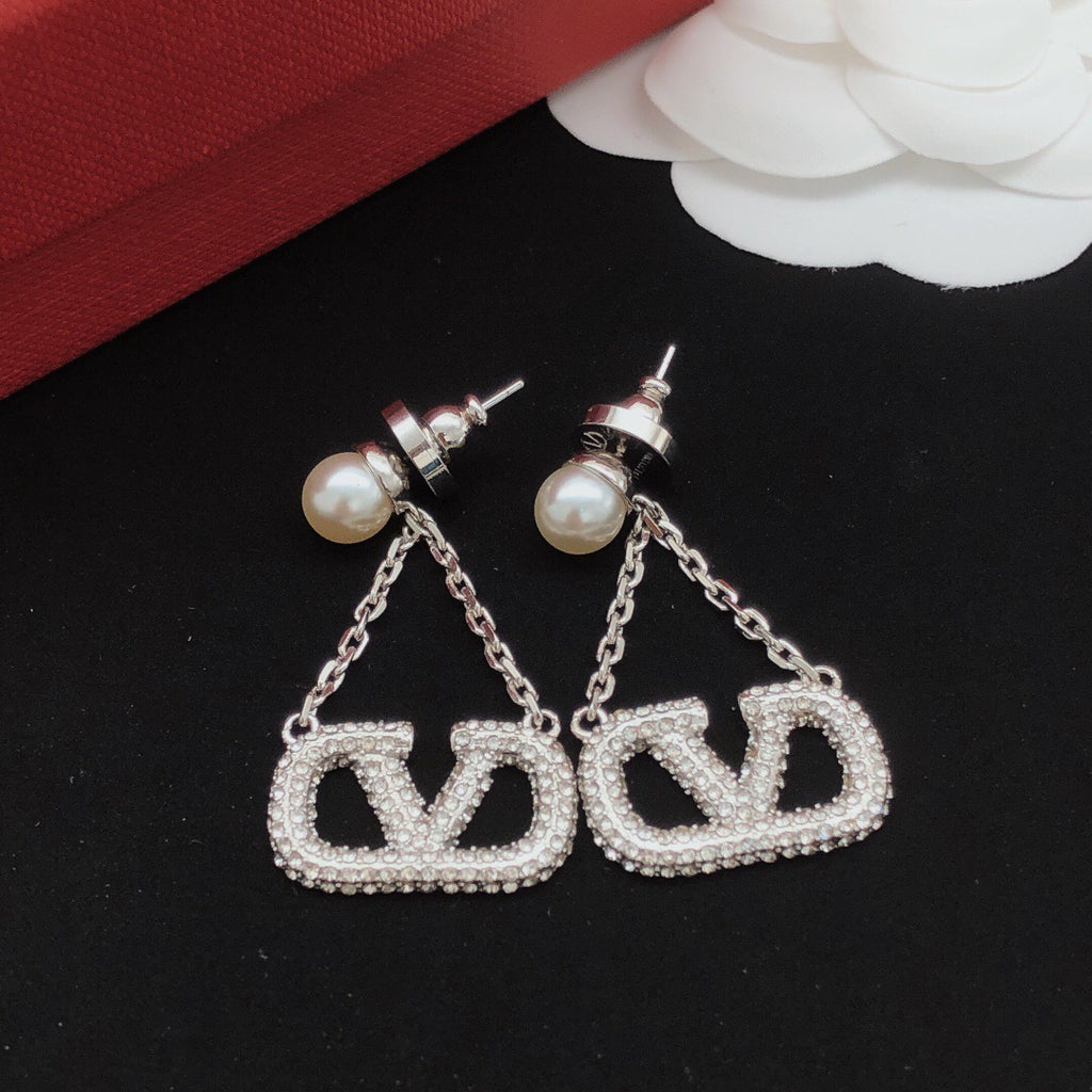 Signature Emblem Crystal-Accent Stud Earrings – Design 19 close-up view