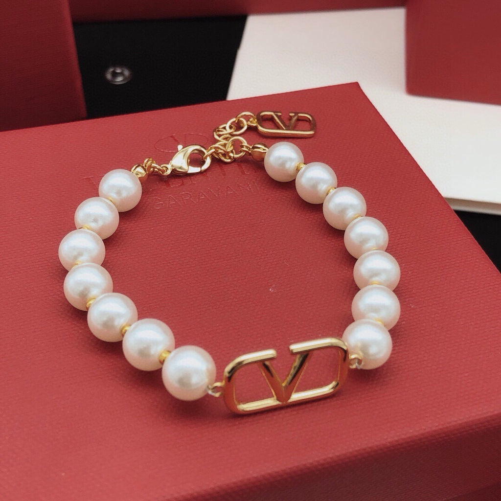 Signature Emblem Bracelet in Gold-Tone – Design 11 close-up view