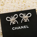 Double-C Emblem Stud Earrings in Polished Metal-Tone – Design 437 main product view