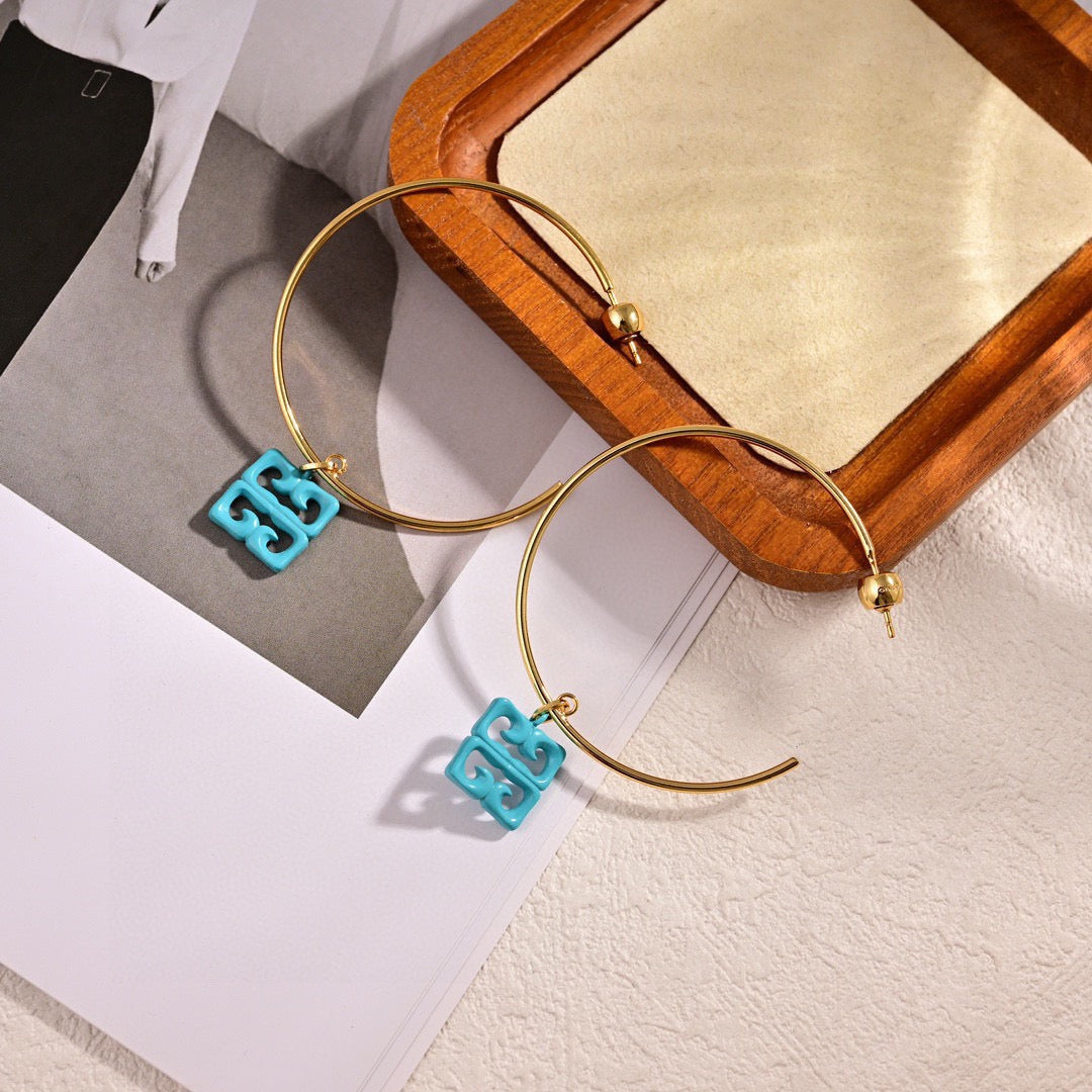Signature Emblem Statement Earrings in Polished Metal-Tone – Design 028 close-up detail