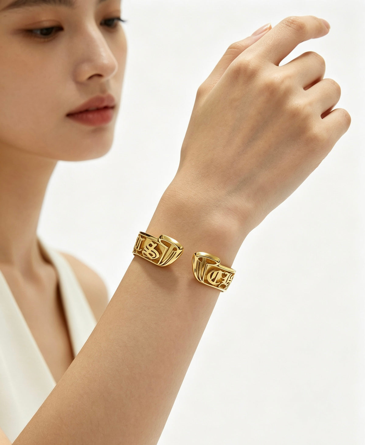 Signature Emblem Bangle in Polished Metal-Tone – Design 004 front product view