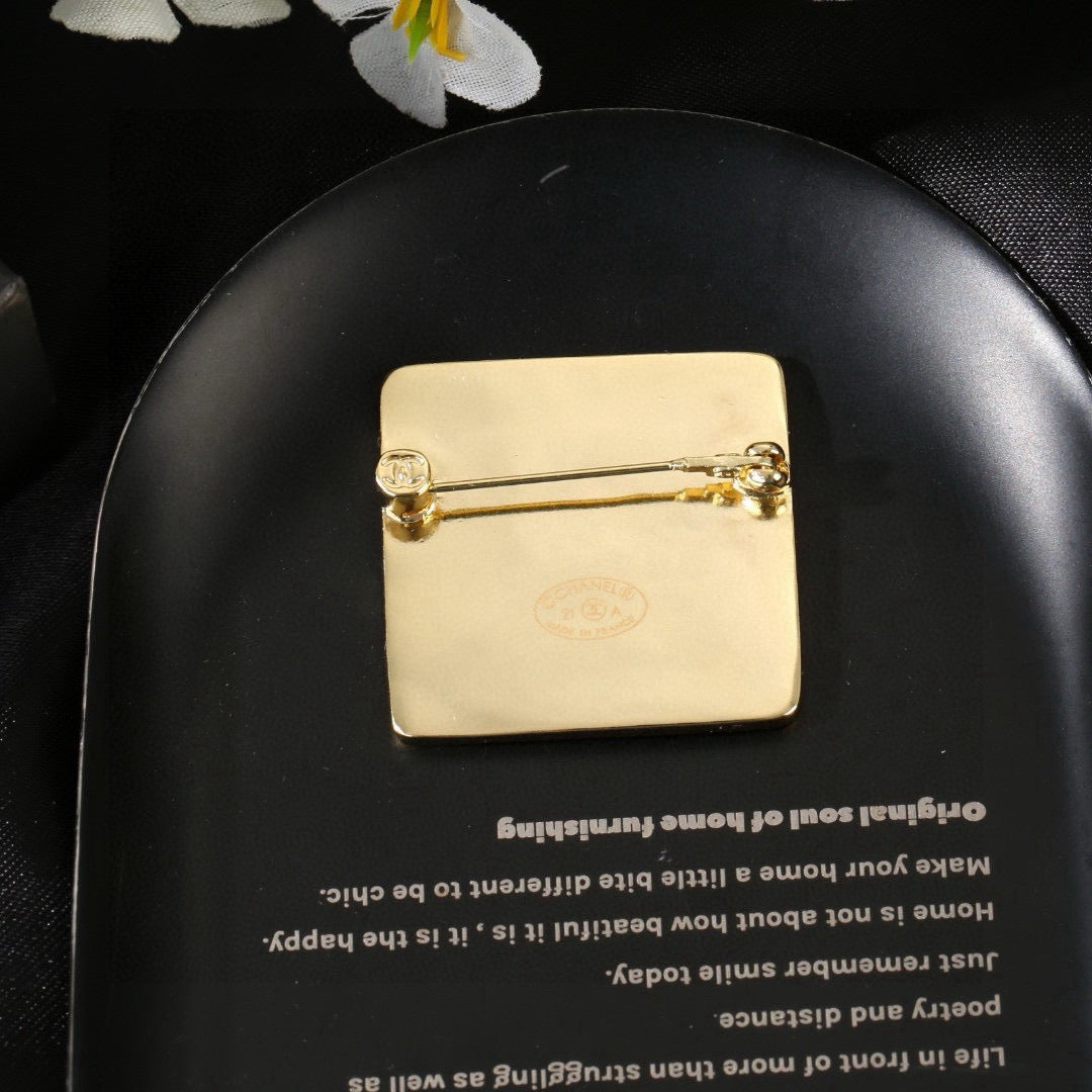 Signature Emblem Brooch in Polished Metal-Tone – Design 018 front product view