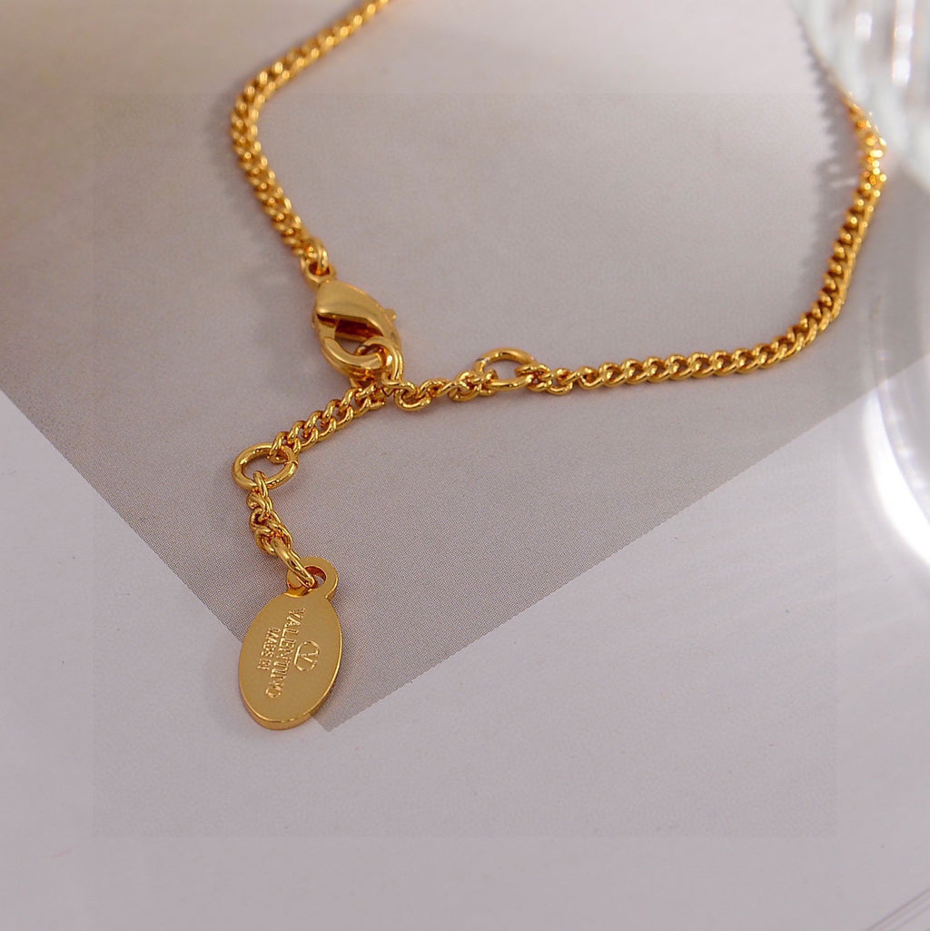 Signature Emblem Bracelet in Gold-Tone – Design 01 close-up view