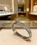 Serpentine Bangle in Polished Metal-Tone – Serpentine Detail – Design 006 main product view