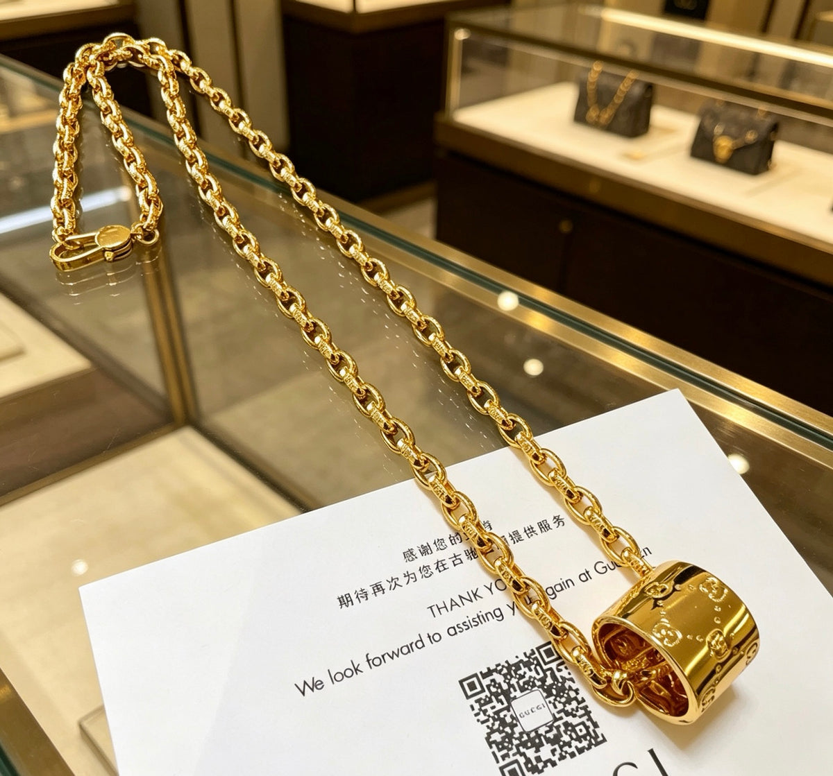 Double-G Emblem Pendant Necklace in Gold-Tone – Design 012 close-up detail