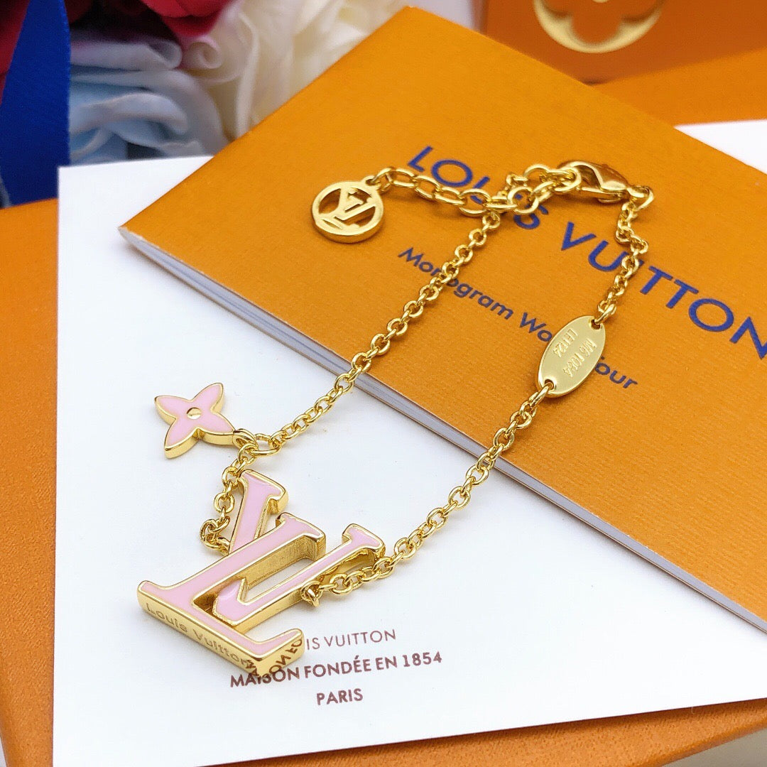 Geometric Emblem Bracelet in Gold-Tone – Pink Detail – Design 004 styled product view