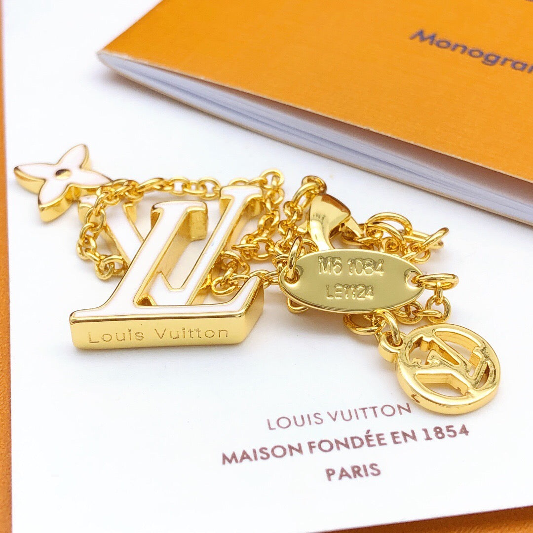 Geometric Emblem Bracelet in Gold-Tone – White Detail close-up detail