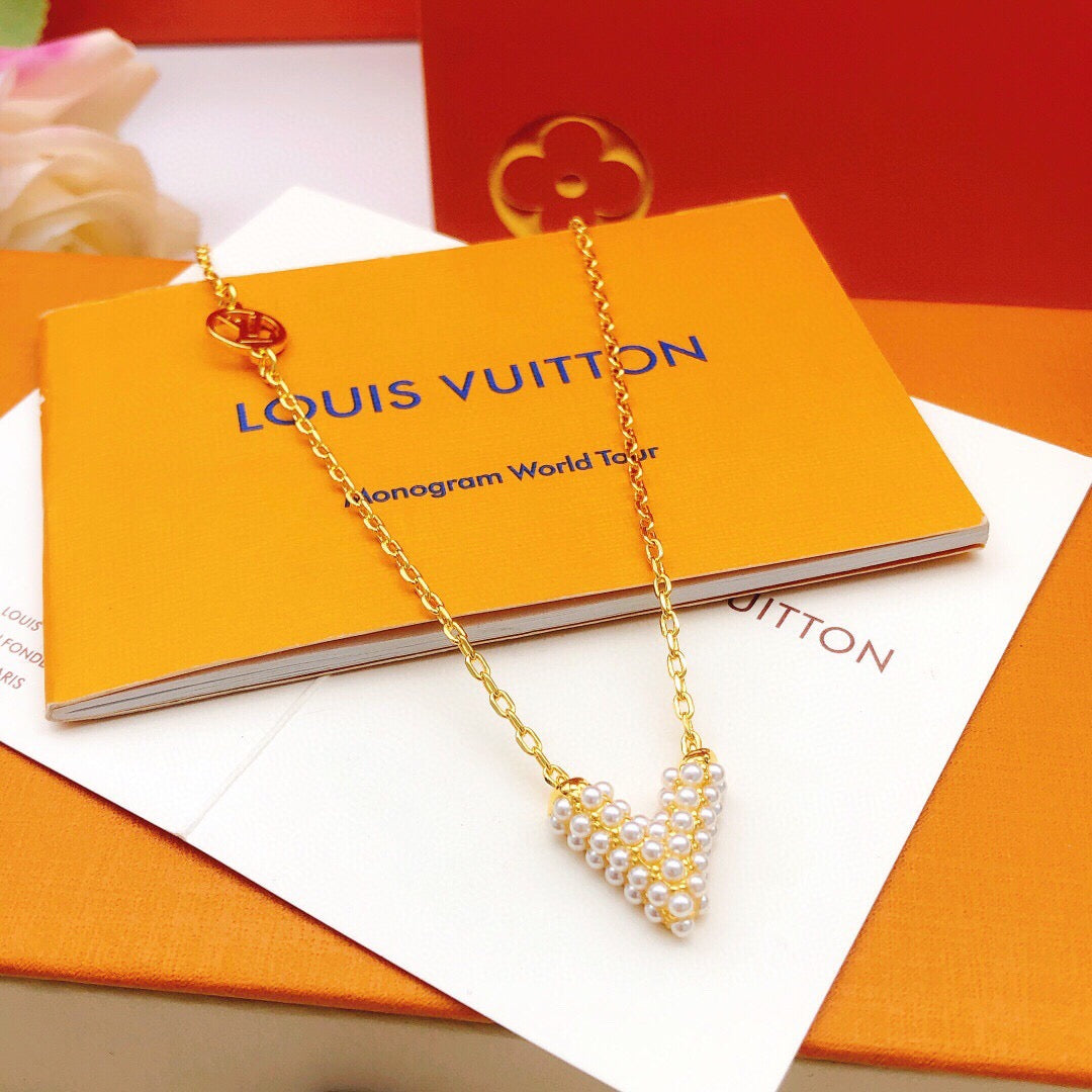 Geometric Emblem Pendant Necklace in Gold-Tone – Pearl Detail detail view