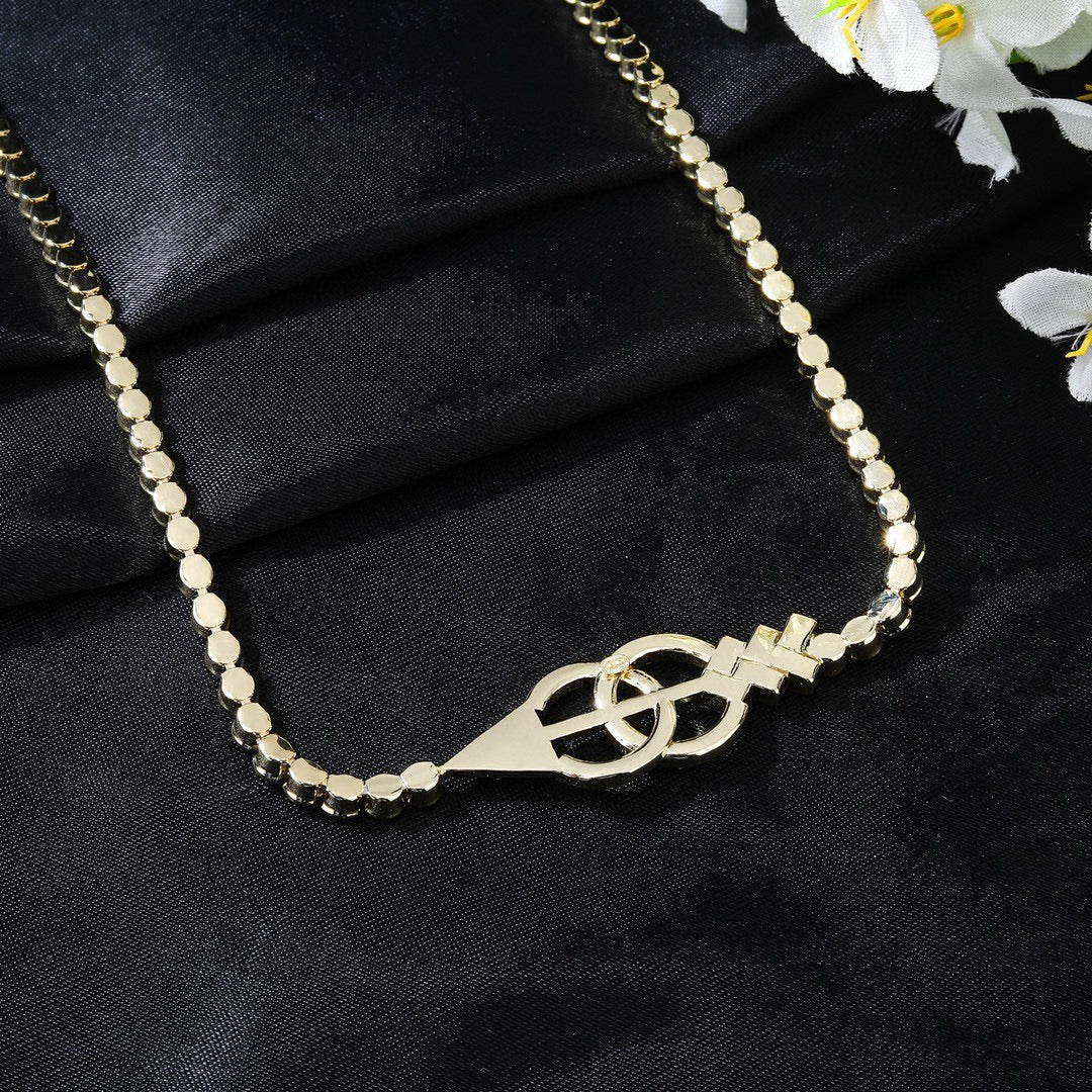 Signature Emblem Jewelry Accessory in Polished Metal-Tone – Design 015 close-up detail