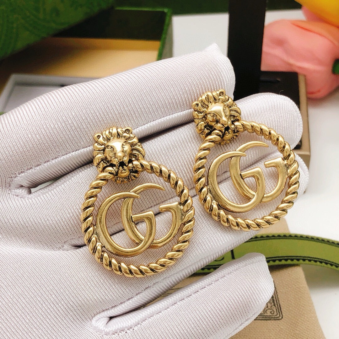 Double-G Emblem Stud Earrings in Polished Metal-Tone – Vintage Detail – Design 004 front product view