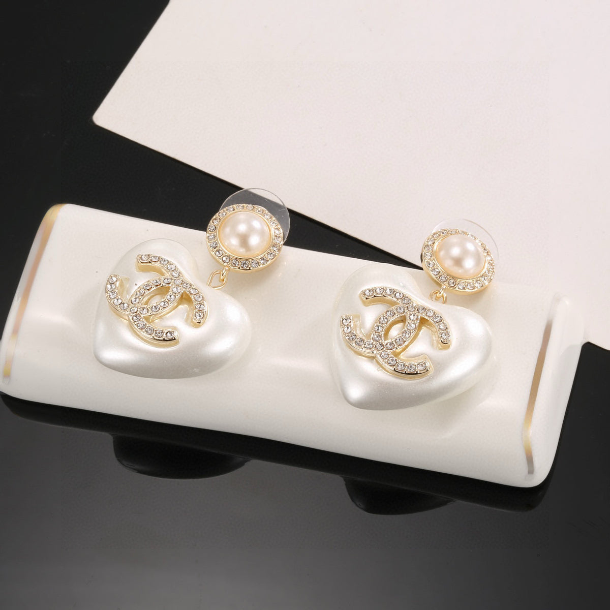 Signature Emblem Stud Earrings in Polished Metal-Tone – Design 015 close-up detail