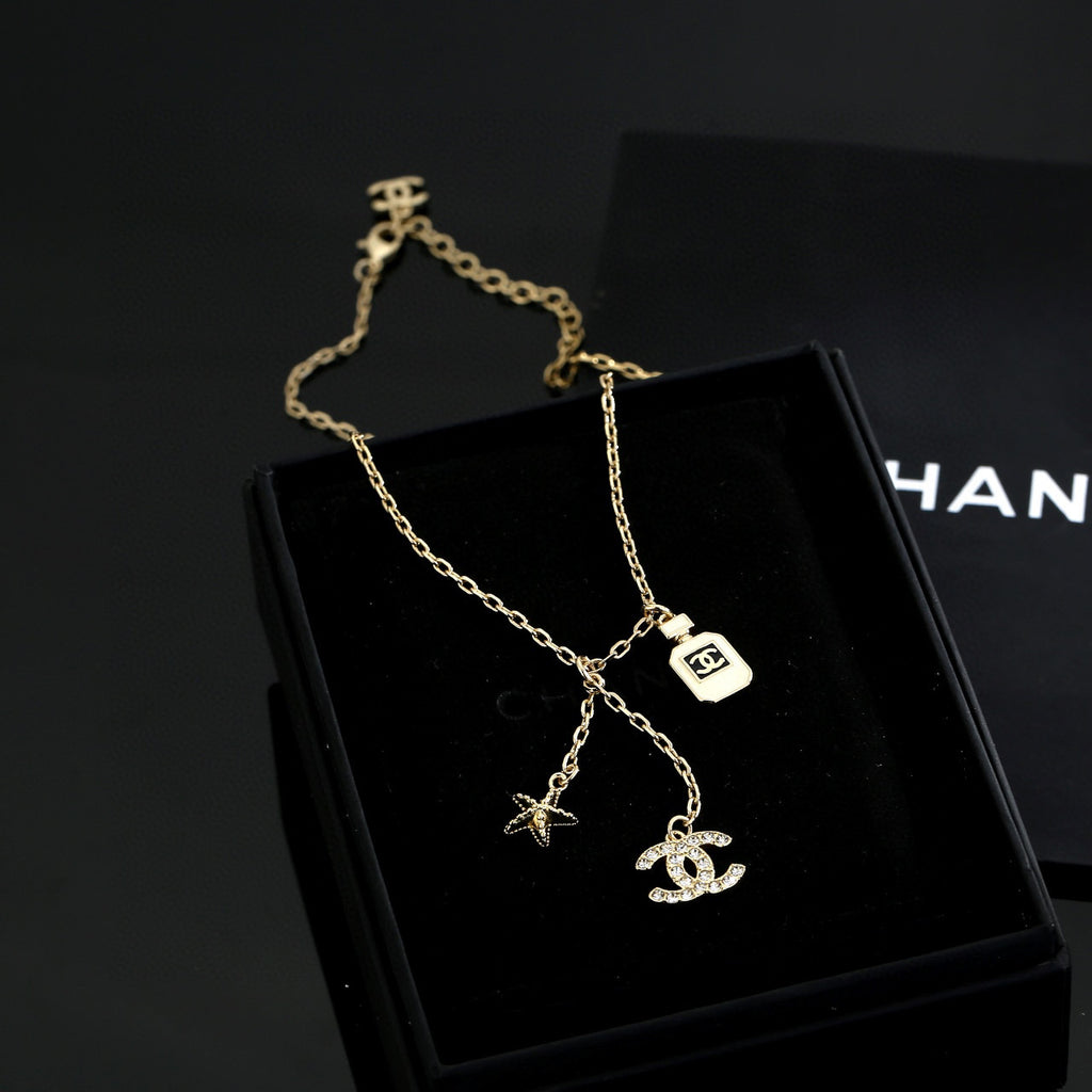 Double-C Emblem Pendant Necklace in Polished Metal-Tone – Design 009 close-up detail