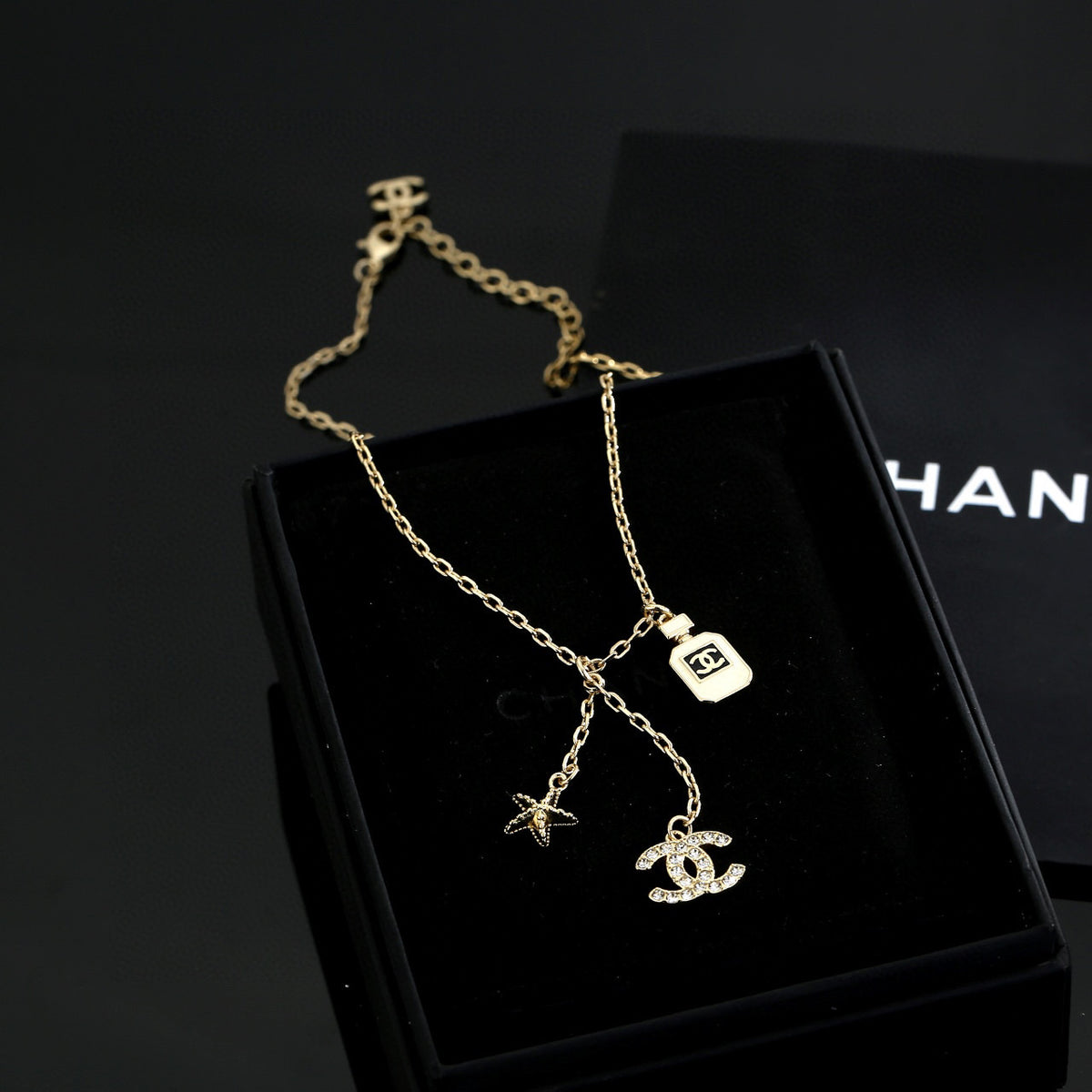 Double-C Emblem Pendant Necklace in Polished Metal-Tone – Design 010 close-up detail