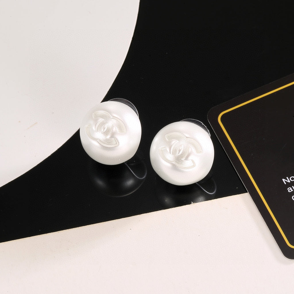 Double-C Emblem Stud Earrings in Polished Metal-Tone – White Detail main product view