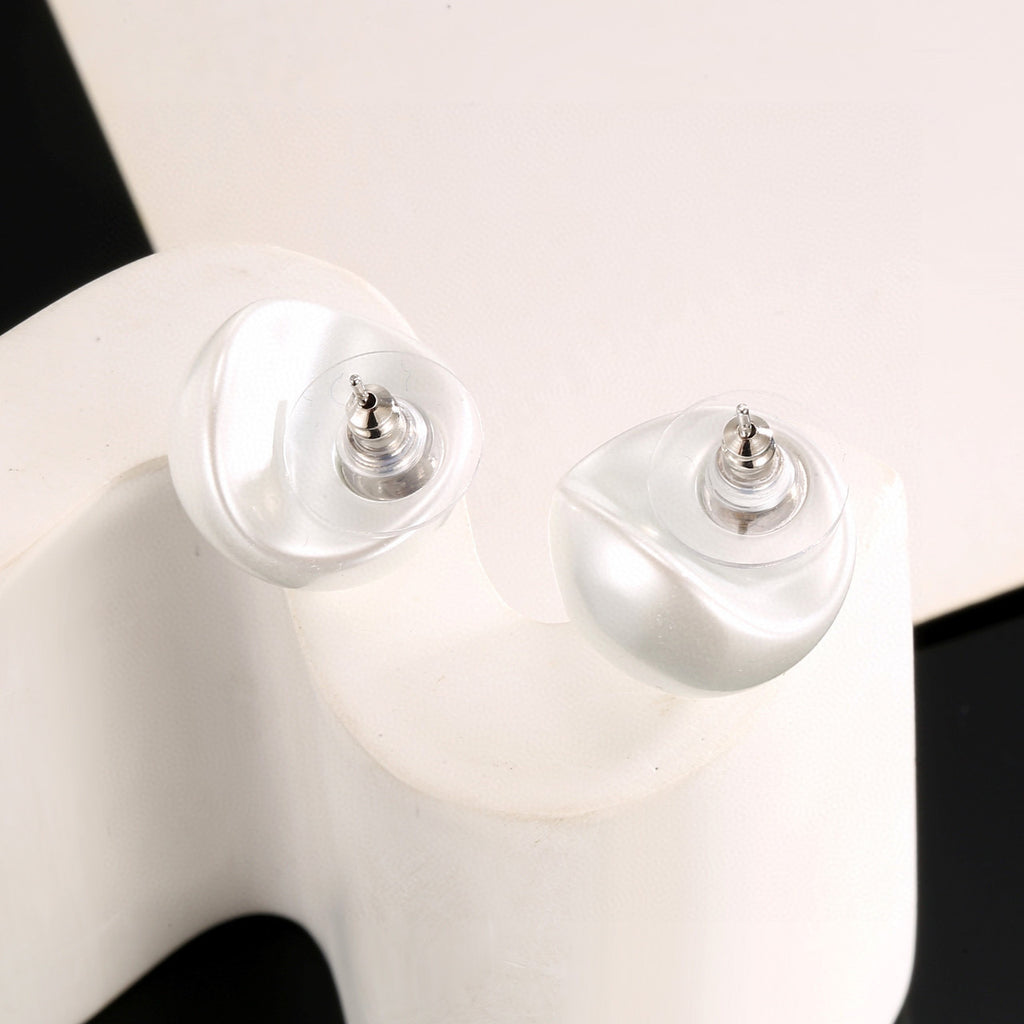 Double-C Emblem Stud Earrings in Polished Metal-Tone – White Detail main product view