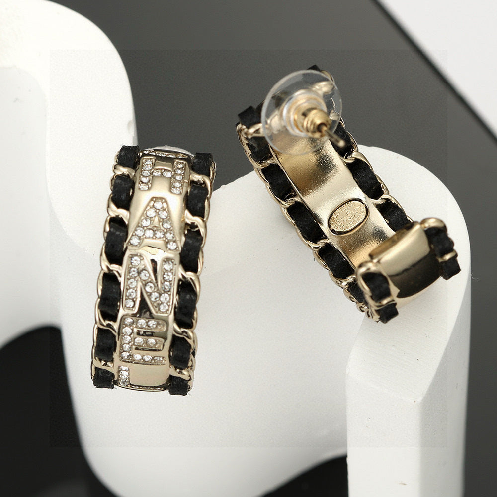 Signature Emblem Stud Earrings in Silver-Tone – Black Detail – Design 002 detail view