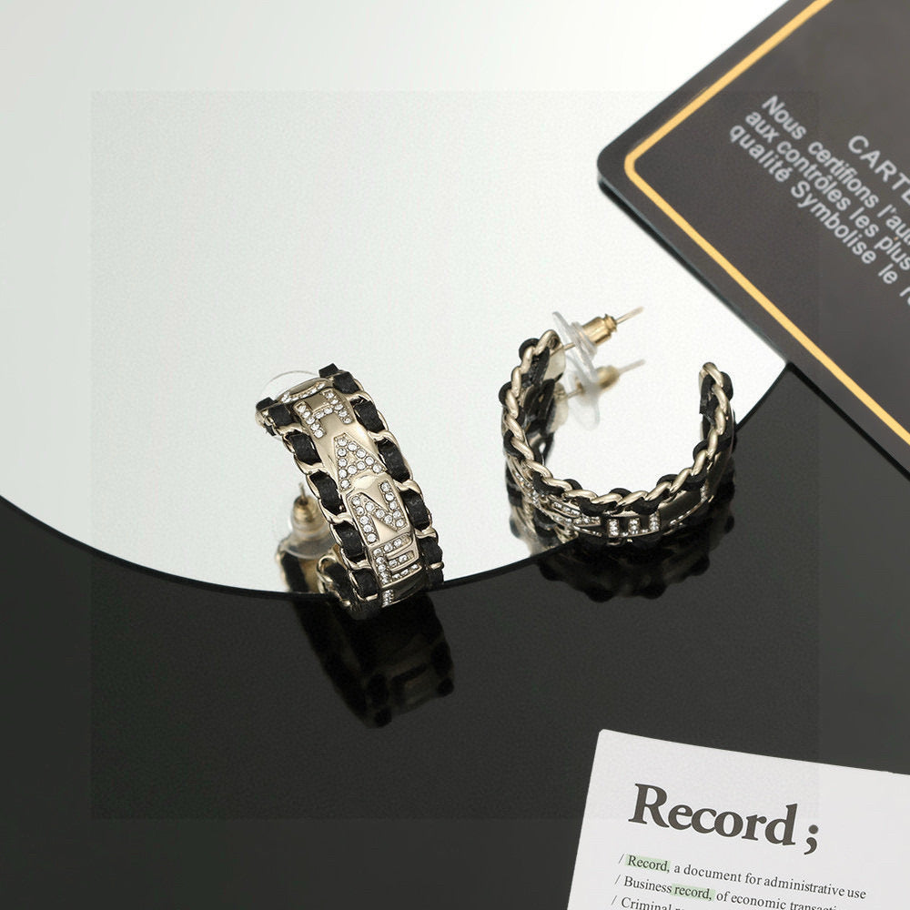Signature Emblem Stud Earrings in Silver-Tone – Black Detail main product view
