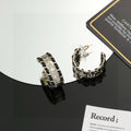 Signature Emblem Stud Earrings in Silver-Tone – Black Detail main product view