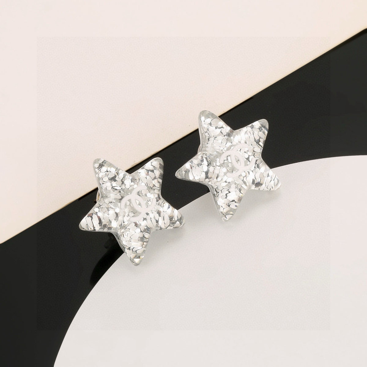 Double-C Emblem Stud Earrings in Silver-Tone – Star Detail front product view