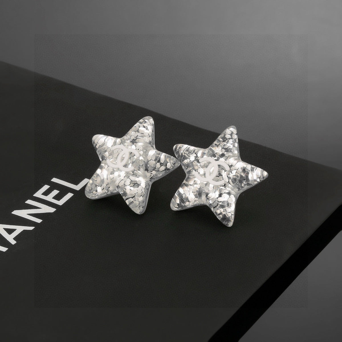Double-C Emblem Stud Earrings in Silver-Tone – Star Detail side detail