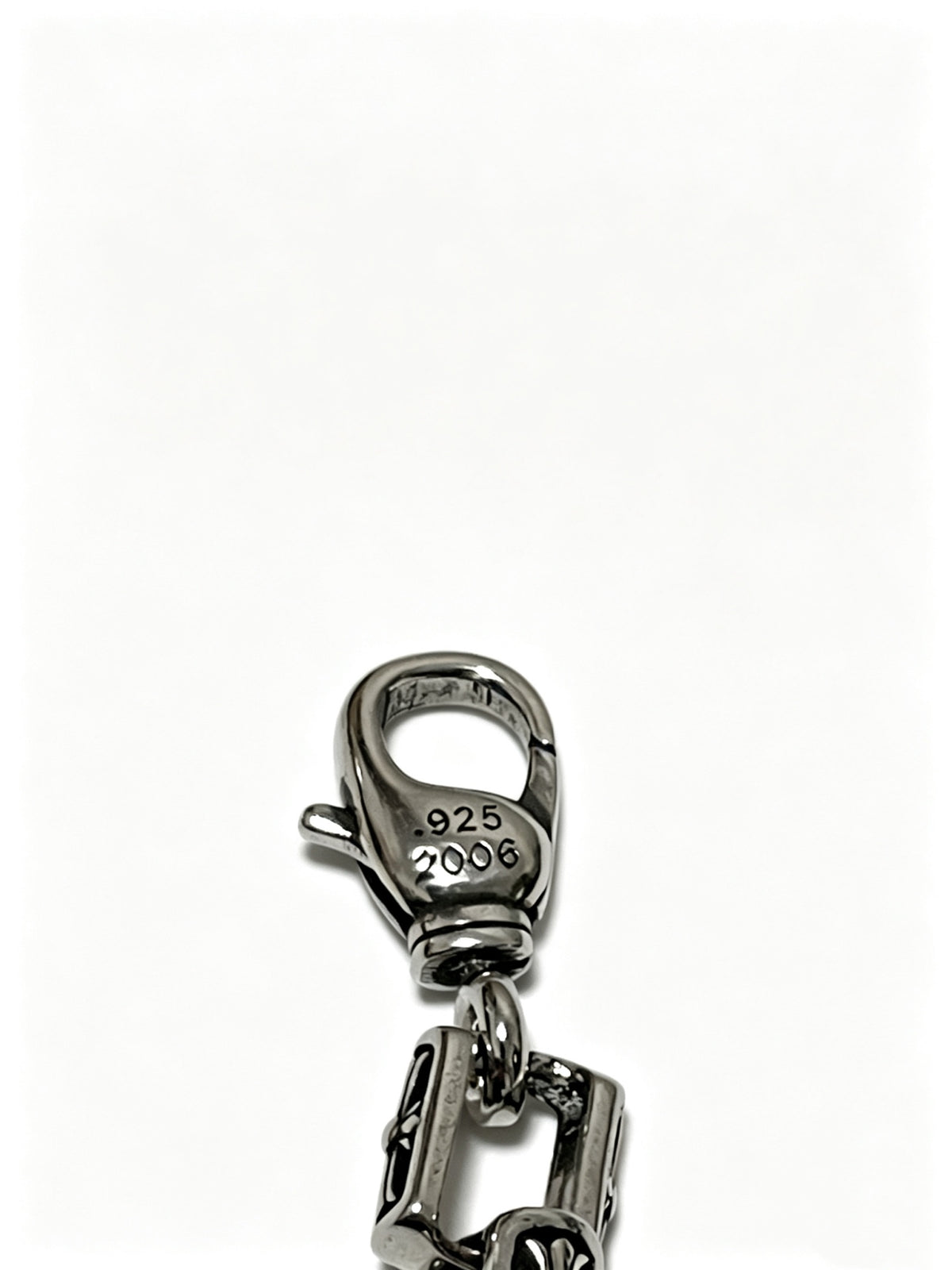Signature Emblem Bracelet in Polished Metal-Tone – Design 016 close-up detail