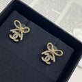 Double-C Emblem Stud Earrings in Polished Metal-Tone – Design 127 main product view