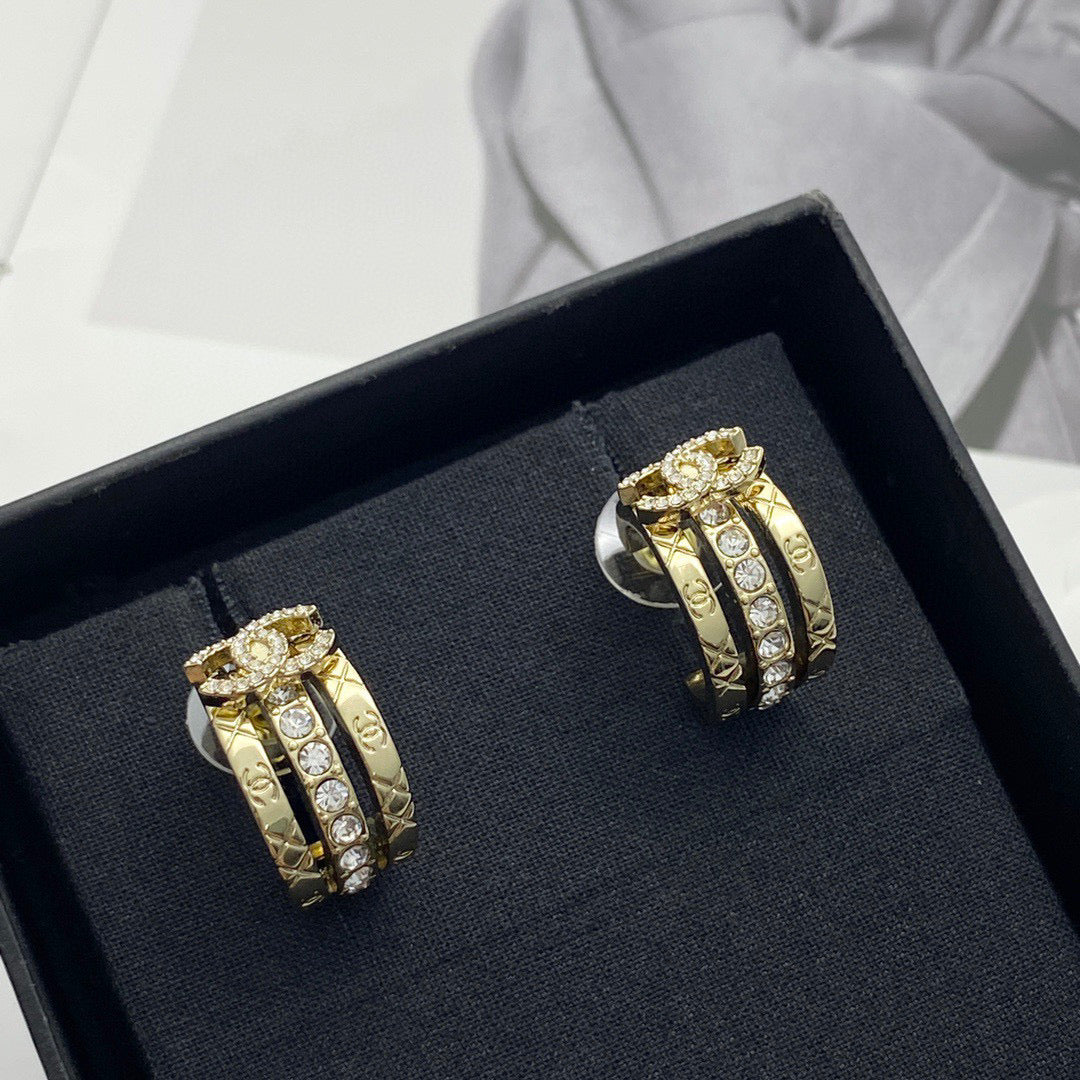 Signature Emblem Crystal-Accent Stud Earrings – Design 006 close-up detail