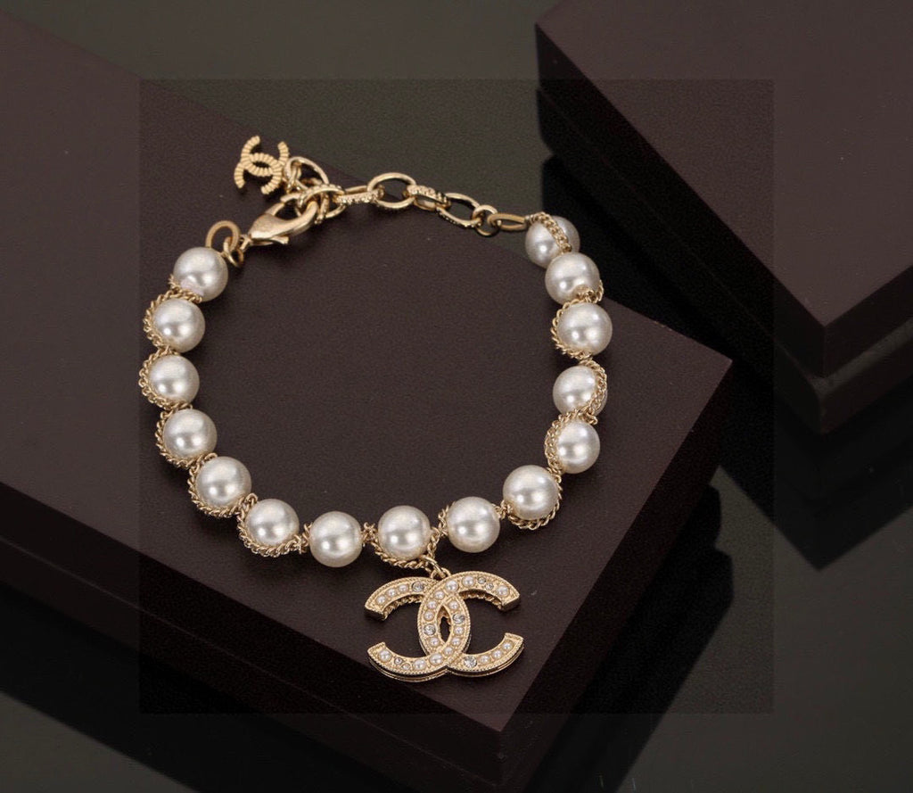 Double-C Emblem Bracelet in Polished Metal-Tone – Pearl Detail – Design 002 front product view