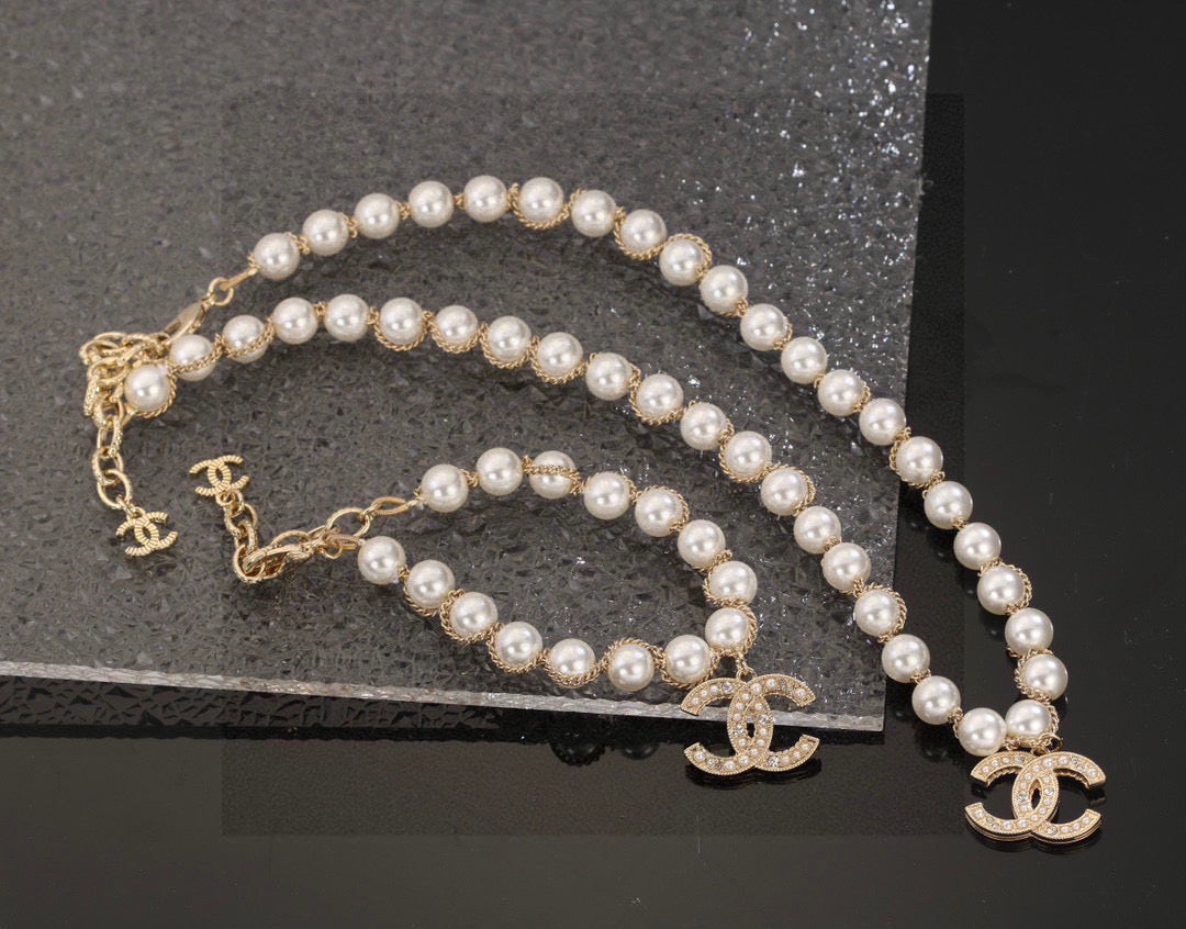 Double-C Emblem Bracelet in Polished Metal-Tone – Pearl Detail – Design 002 front product view