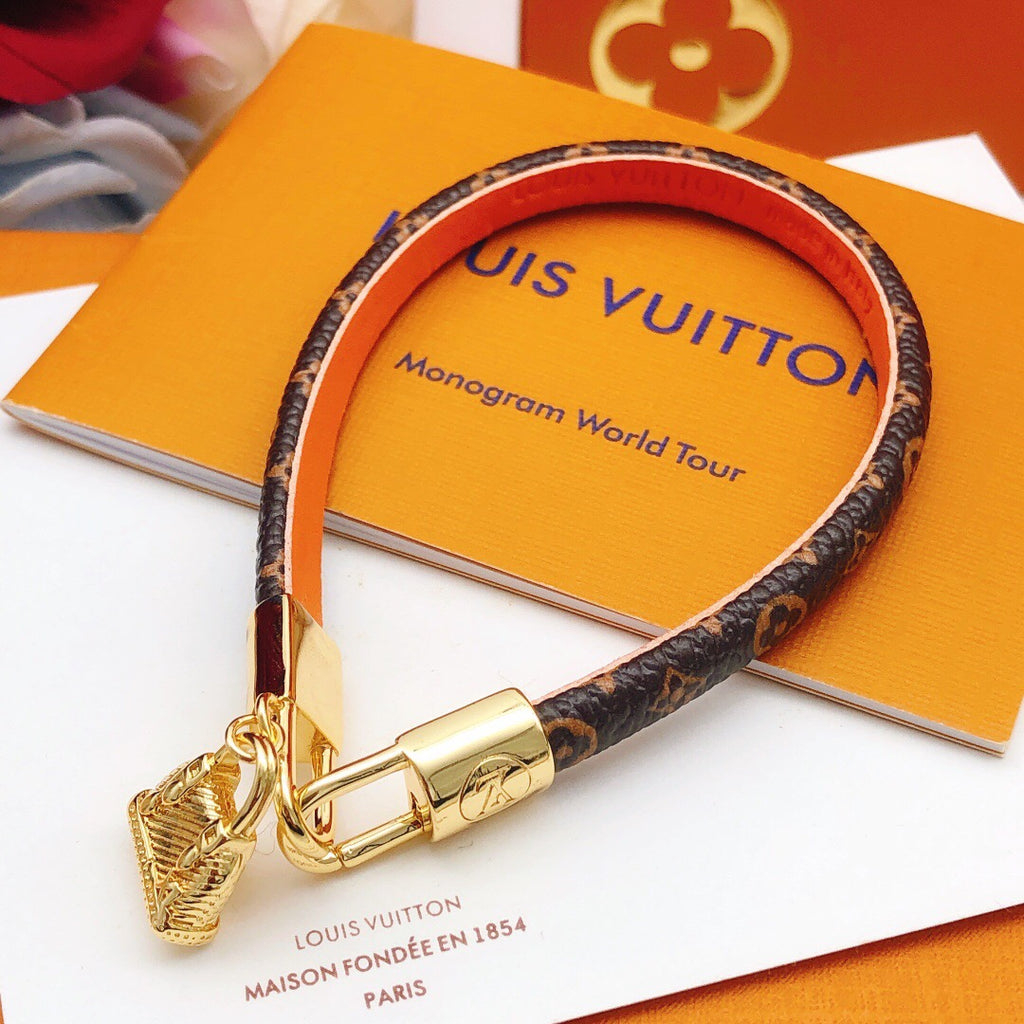 Geometric Emblem Bangle in Gold-Tone – Leather Detail front product view