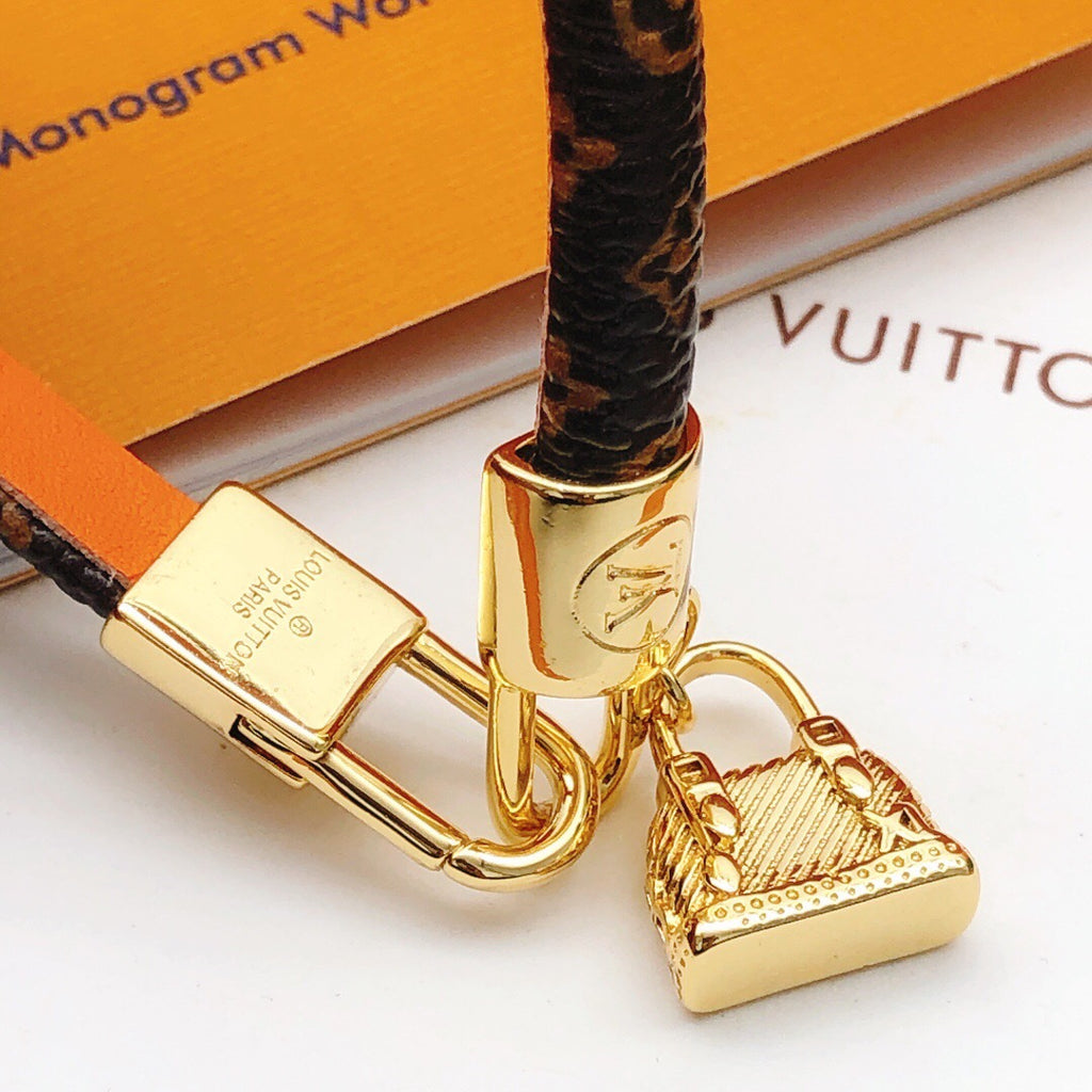 Geometric Emblem Bangle in Gold-Tone – Leather Detail side detail