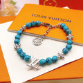 Geometric Emblem Bracelet in Gold-Tone – Blue Detail – Design 002 main product view