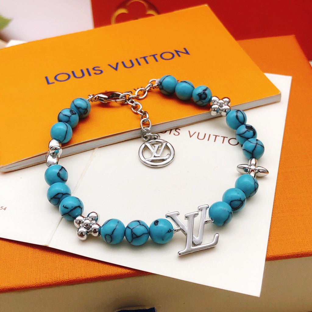 Geometric Emblem Bracelet in Gold-Tone – Blue Detail – Design 004 front product view