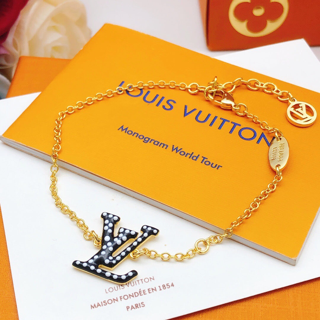 Geometric Emblem Bracelet in Gold-Tone – Black Detail main product view