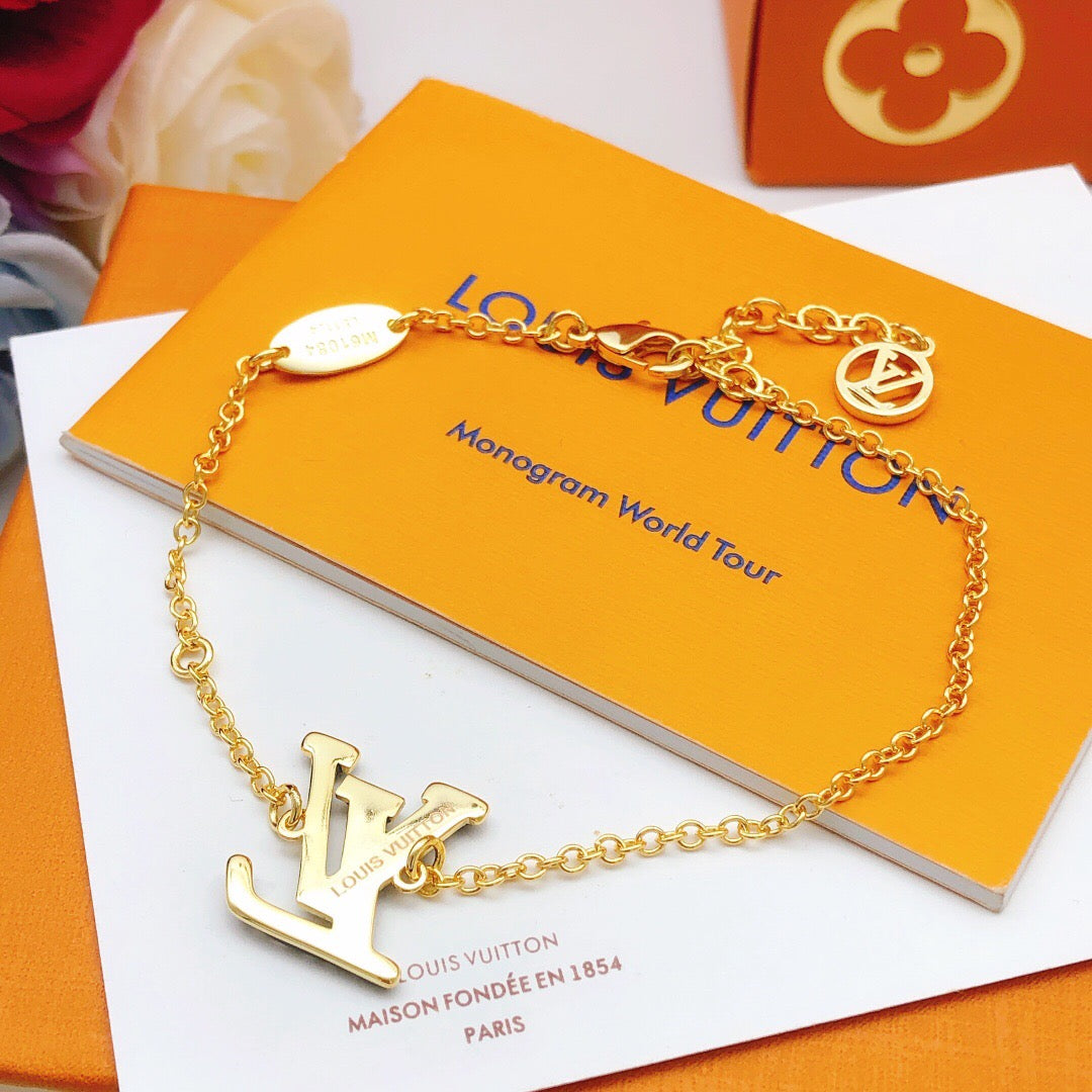 Geometric Emblem Bracelet in Gold-Tone – Black Detail front product view