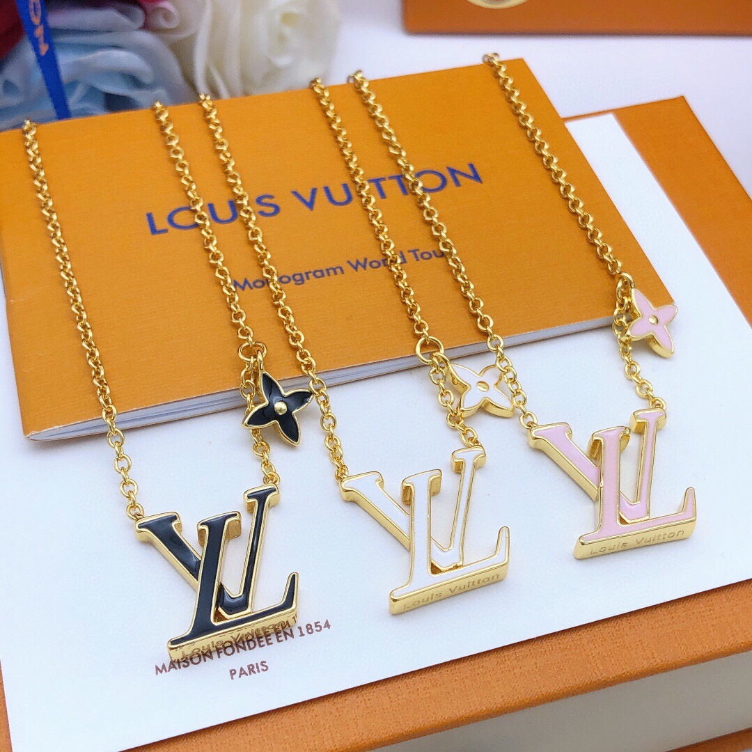 Geometric Emblem Pendant Necklace in Gold-Tone – Black Detail styled product view