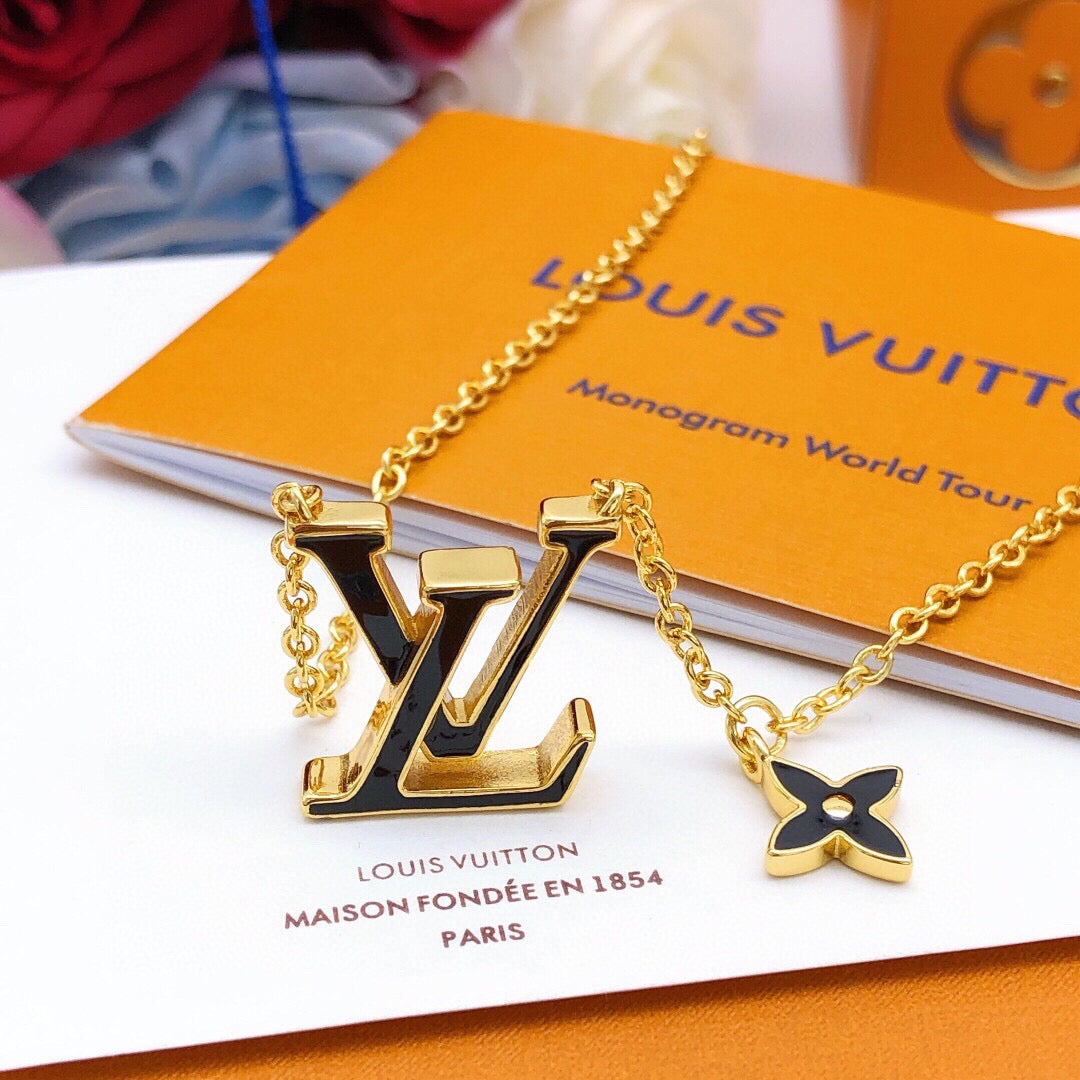 Geometric Emblem Pendant Necklace in Gold-Tone – Black Detail detail view