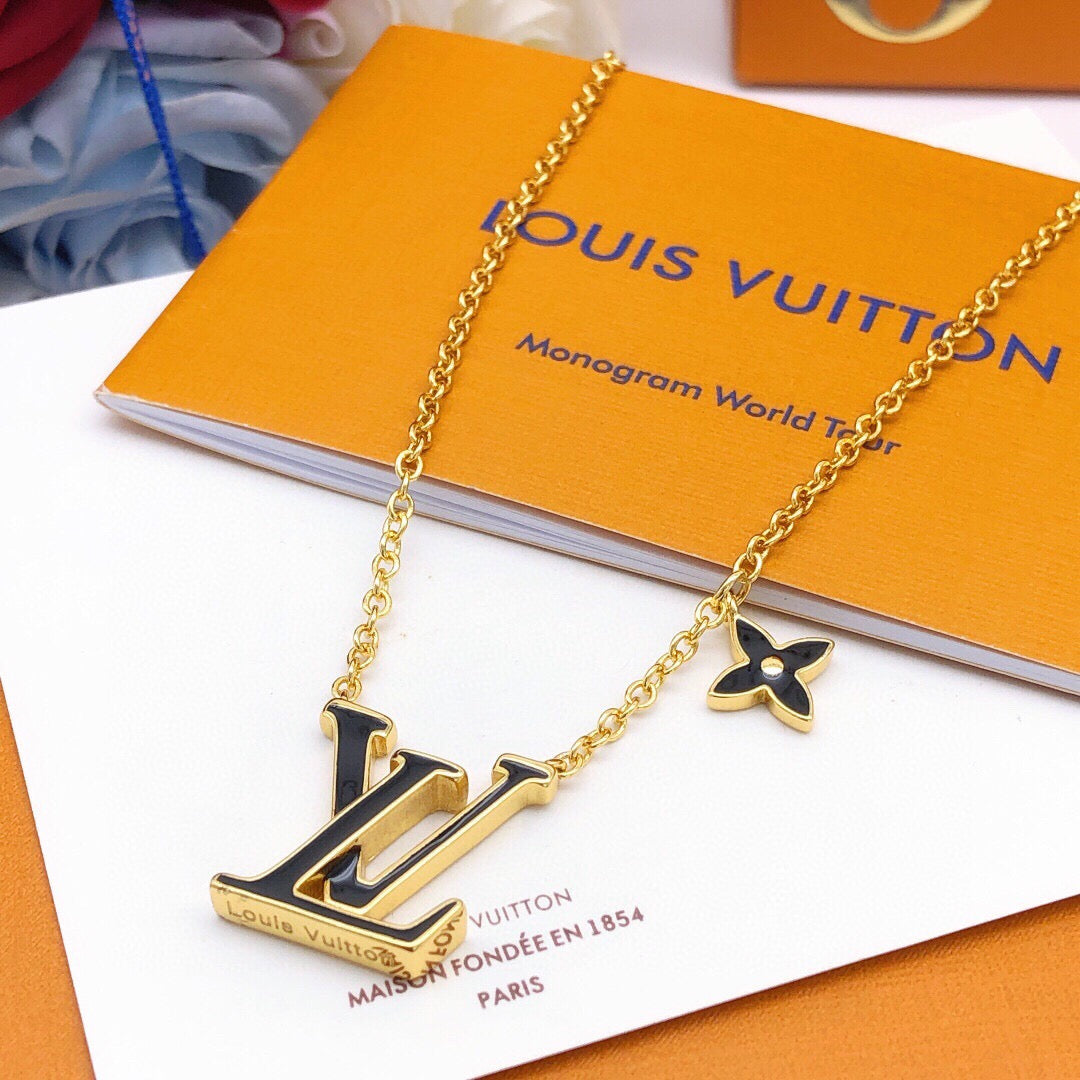 Geometric Emblem Pendant Necklace in Gold-Tone – Black Detail front product view