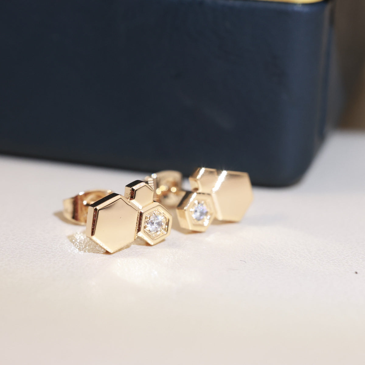 Signature Emblem Stud Earrings in Polished Metal-Tone – Design 001 main product view