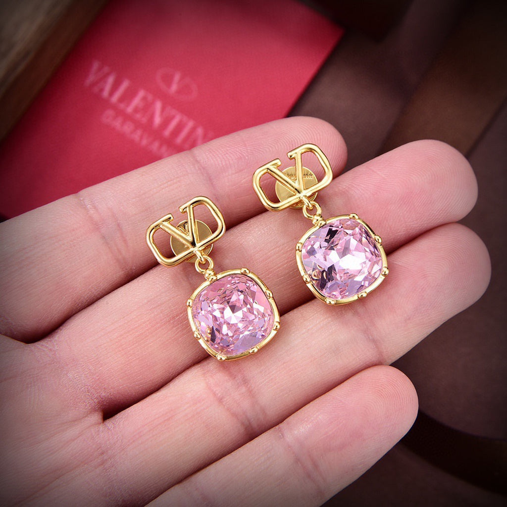 Signature Emblem Stud Earrings in Gold-Tone – Design 01 close-up view