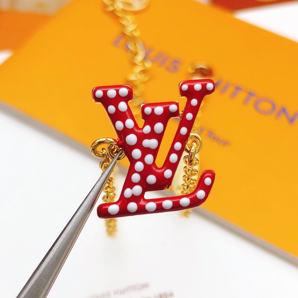 Geometric Emblem Bracelet in Gold-Tone – Red Detail front product view