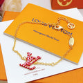Geometric Emblem Bracelet in Gold-Tone – Red Detail main product view