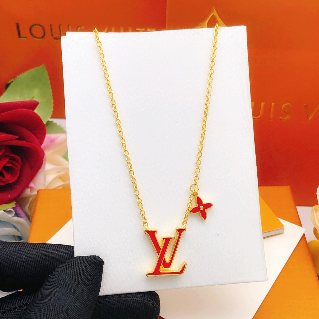 Geometric Emblem Pendant Necklace in Gold-Tone – Red Detail close-up detail