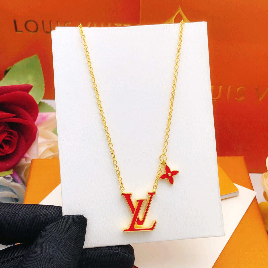 Geometric Emblem Pendant Necklace in Gold-Tone – Red Detail close-up detail